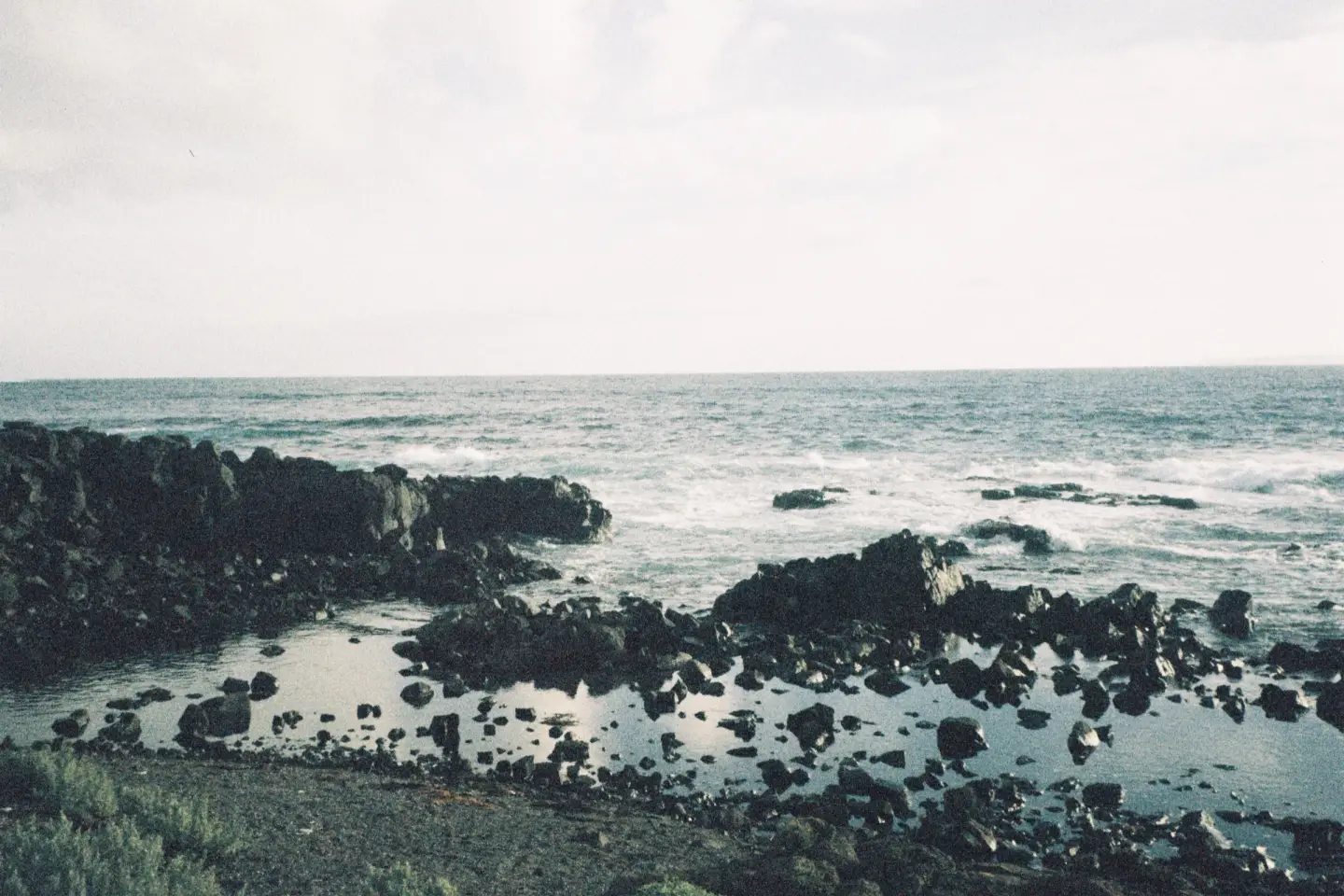 Rocky coastline with waves