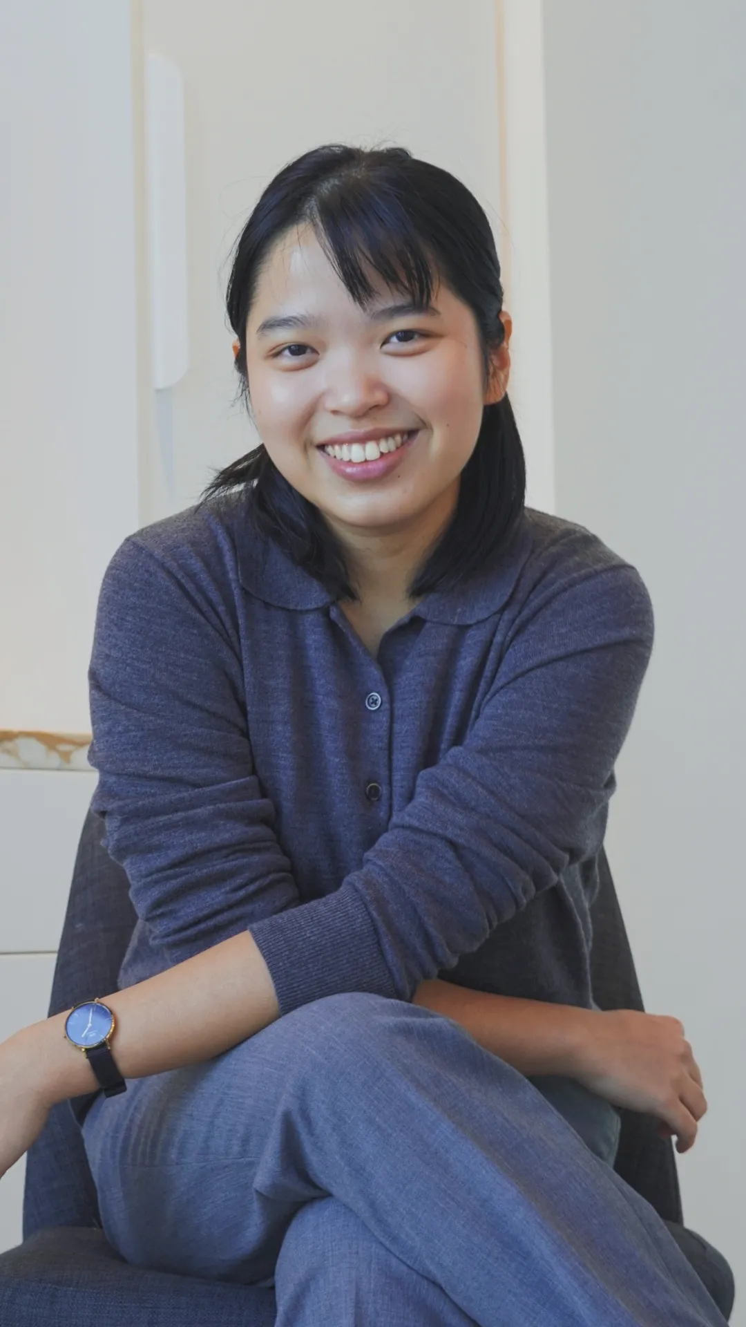 Shierly, smiling warmly